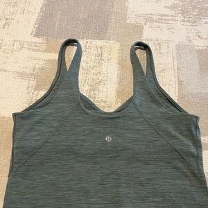 Lululemon crop tank top with bra underneath size S/M tags and labels removed.
